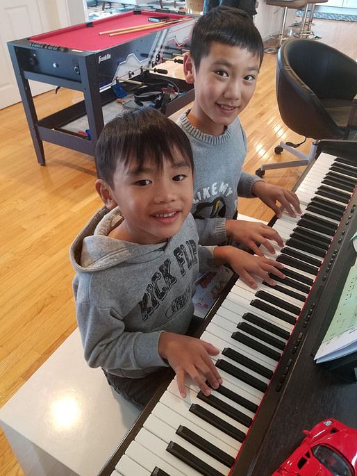 brothers in piano lessons